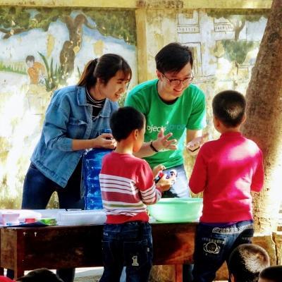 Childcare volunteers teach local children in Vietnam about proper hand washing. Children are taught about hygiene and washing hands by Projects Abroad volunteers at a care centre in Vietnam.